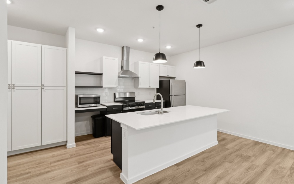 B2G - 2 bedroom floorplan layout with 2 bathrooms and 1131 square feet (Kitchen
)